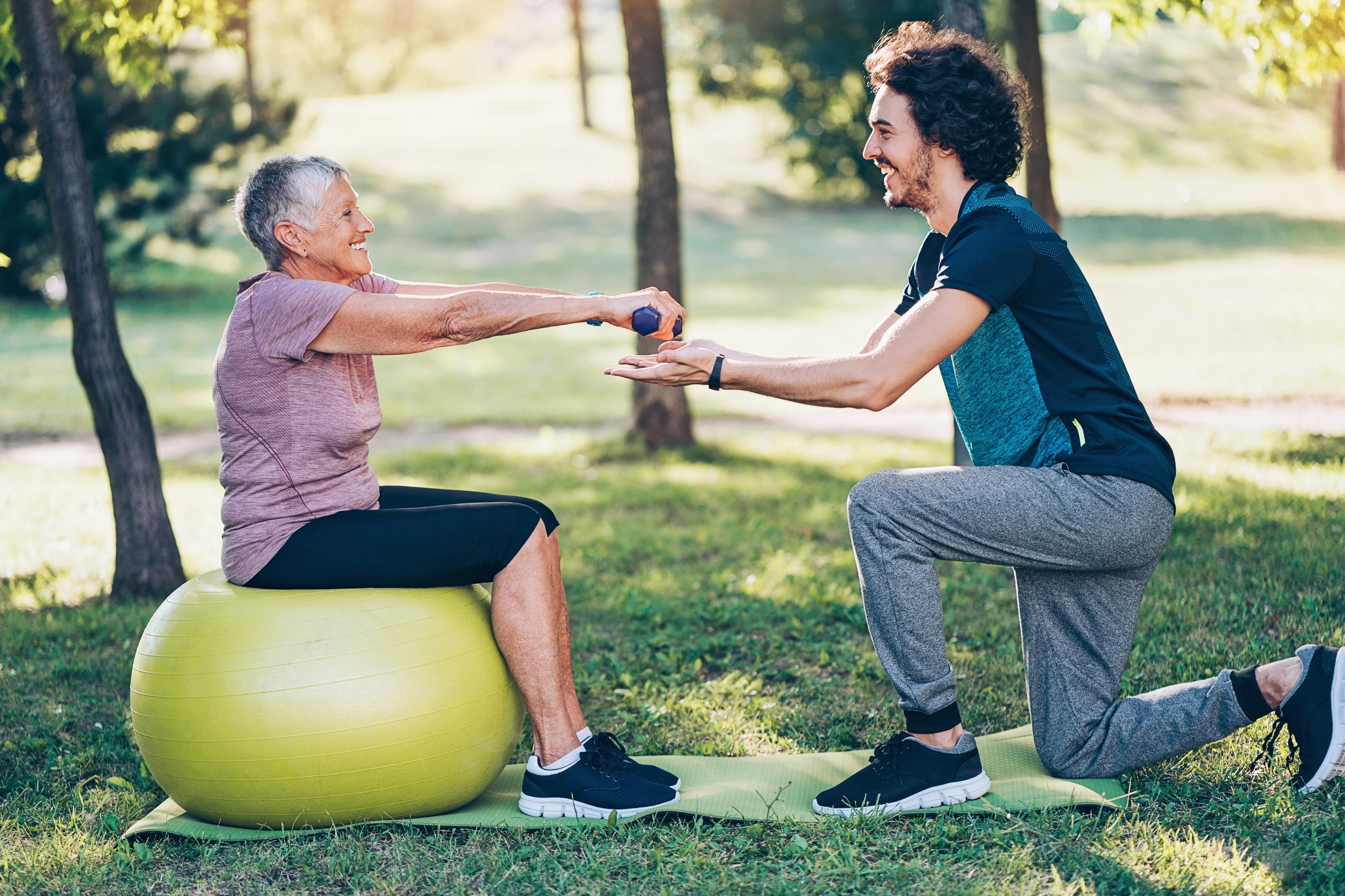 elderly-woman-working-out-with-grandson