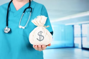 Nurse holding a bag of dollar coins