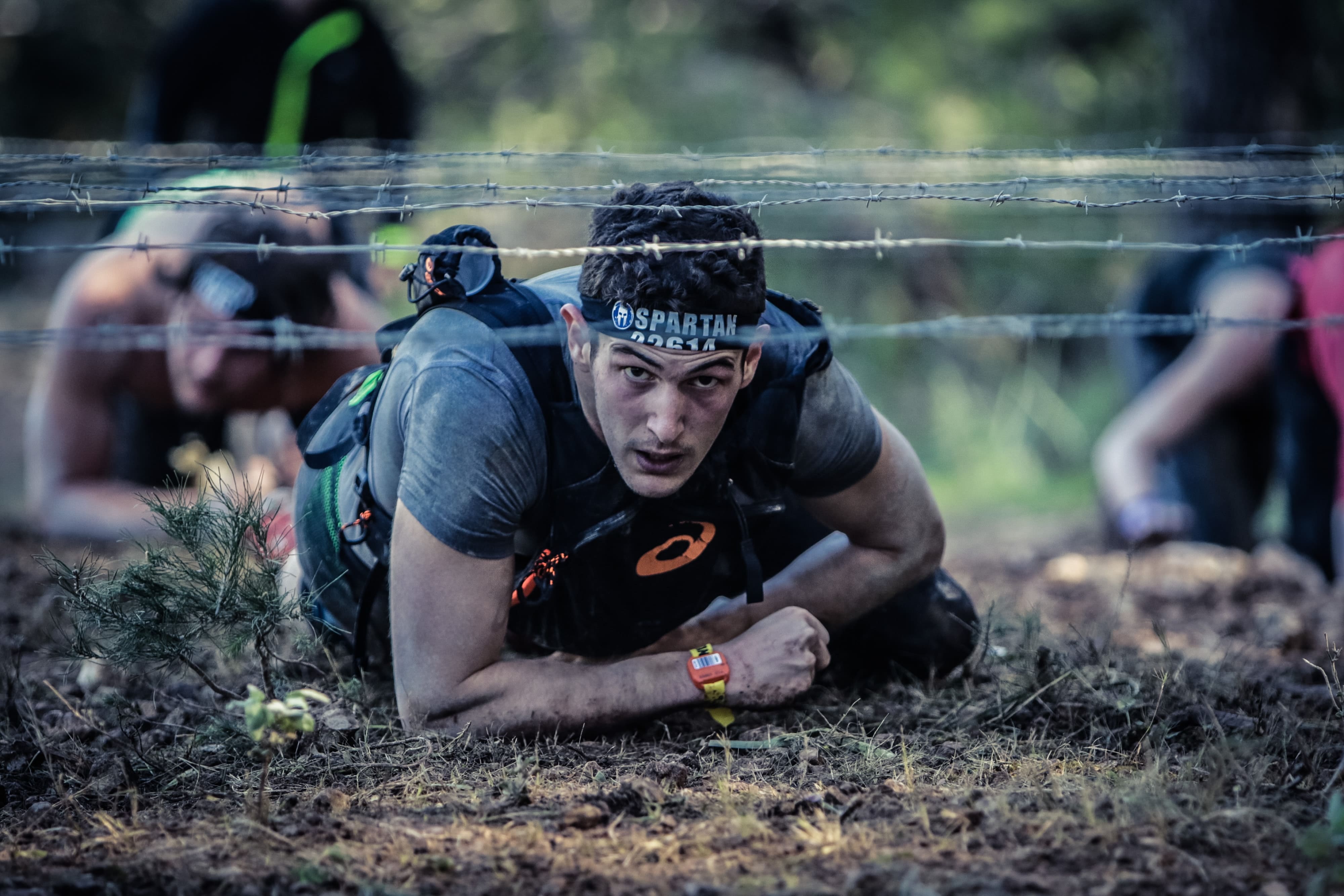 Spartan racer powered by hydrolyzed collagen peptides is going through an obstacle